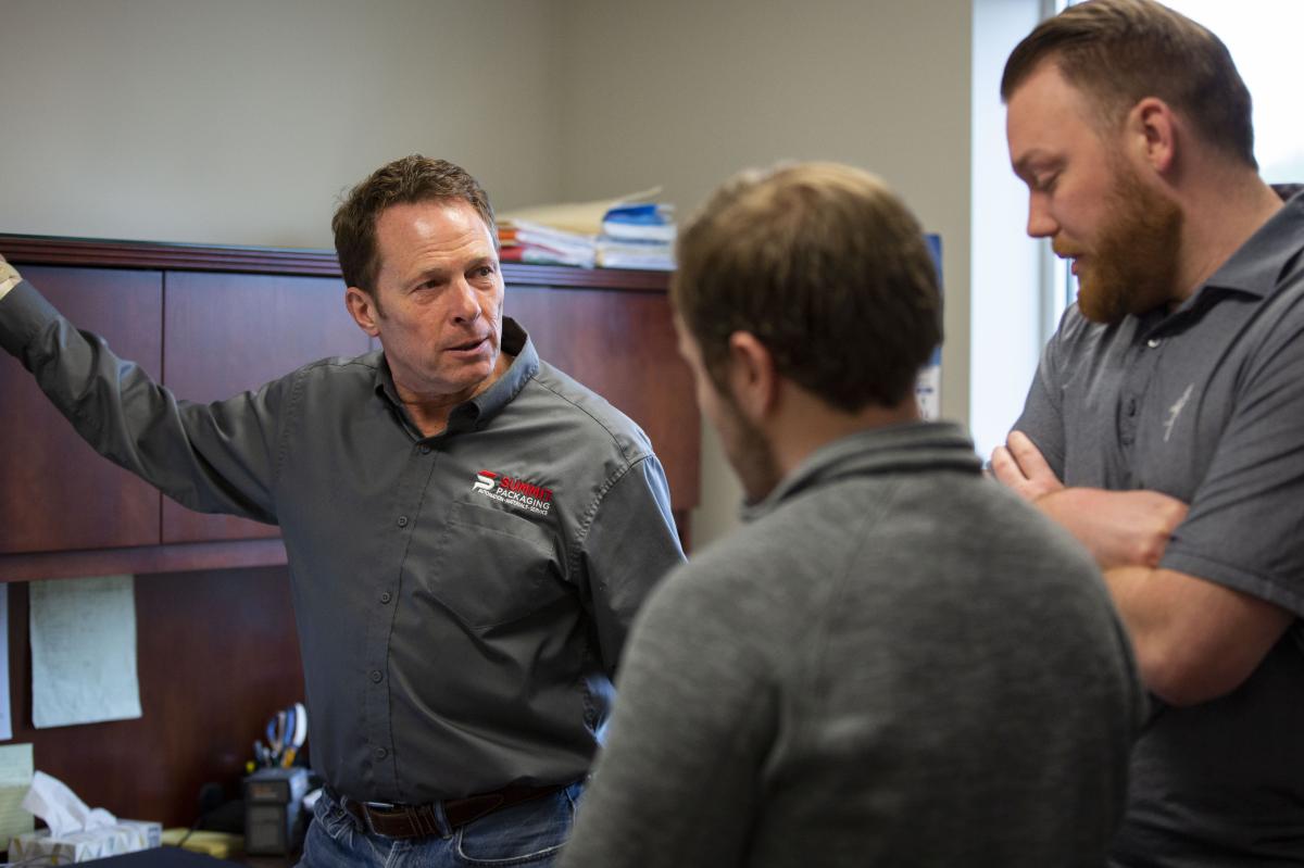 Team meeting at Summit Packaging, led by Greg Ong.